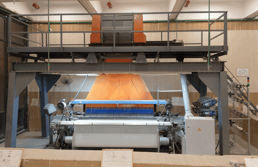 Rapier Weaving machine